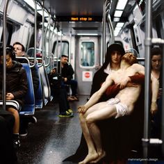 a naked man is sitting on the subway