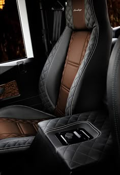 the interior of a car with leather seats