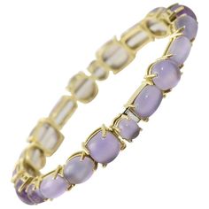 Roberto Coin Shanghai Amethyst Gold Bangle Bracelet features 42 carats of amethyst mounted in a 18k yellow gold. This bracelet has multi-shape prong set amethyst station. It is made in Italy. Estimated Retail $6,000 Roberto Coin Bracelet, Modern Bangle, 18k Gold Bracelet, Modern Bracelets, Yellow Gold Bangle, Diamond Bangles Bracelet, Amethyst Gold, Roberto Coin, 18k Gold Jewelry