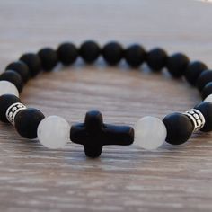 "Cross Bracelet,Onyx Bracelet,8mm Onyx Gemstone Beads,White Jade Beads,Pray,Men,Woman,Protection,Christian Gift,Religious,Spiritual Bracelet * * * * * * * * * * * * * * * * * * * * * * * * * * * * * * * * * The bracelet in the picture shown is 7\" size which fits an average wrist, please select your size from the drop down menu at checkout I will custom make your order, any questions please feel free to contact message me anytime, thank you very much. * * * * * * * * * * * * * * * * * * * * * * Spiritual Rosary Bracelet With 8mm Beads And Cross, Spiritual White Bracelet With Black Beads, White Spiritual Jewelry With Black Beads, White Spiritual Rosary Bracelet, White Cross Bracelet Spiritual Style, White Beaded Spiritual Wristband, White Spiritual Rosary Bracelet With 8mm Beads, White Spiritual Beaded Wristband, Spiritual Black Beads Stretch Bracelet For Healing