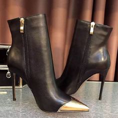 Handcrafted US sizing. Fits true to size. Heel Height: 3" / 80 mm approx Product measurements were taken using size 8. Please note that measurements may vary by size. Black Boots Gold, Gold Pointy Toe Boots, Luxury Gold Heeled Boots With Pointed Toe, Black And Gold Heel Boots, Black Glamorous Boots With 4-inch Heel, Gold Stiletto Heels, Wingtip Boots, Ankle Strap Chunky Heels, Gold Boots