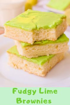 two pieces of lime brownie are stacked on top of each other, with the words fudgy lime brownie recipe below it