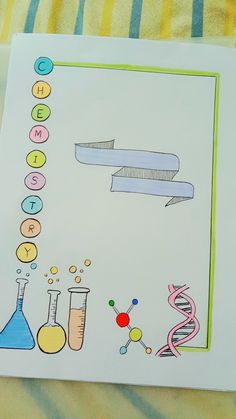 an image of science themed artwork on a sheet of paper with colored markers and flasks