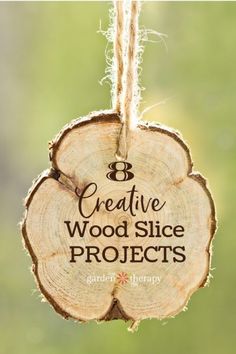 a wooden slice hanging from a rope with the words creative wood slice projects written on it