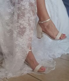 "Ivory Wedding Shoes with delicate lace overylay. Perfect shoes for you or your bridesmaids. The listing picture shoes a comfortable 2 1/4 inch block heel with an ankle strap and a lace overlay. These beautiful bridal shoes are available in over 100 different colors including white, ivory, eggplant, David's Bridal Colors, as the option of sending us a sample swatch to color match for you! * All dyed shoes can bleed when exposed to moisture. If you would like to protect your shoes please consider Dyed Shoes, Bridal Shoes Lace, Bridal Colors, Lace Wedding Shoes, Lace Bridal Shoes, Ivory Bridal Shoes, How To Dye Shoes, Ivory Wedding Shoes, Wedding Shoes Lace