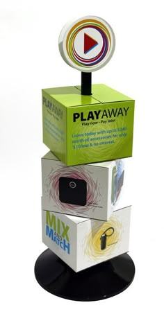 three boxes stacked on top of each other with a playaway sign in the middle