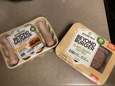 two packages of beyond burgers are sitting on the counter top next to each other