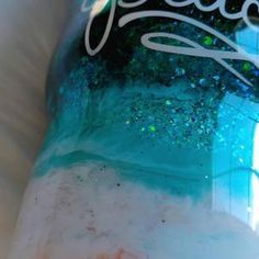 there is a plastic bottle that has some liquid in it and the word pepsi on it