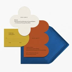 three different colored envelopes on top of each other, one with a paper cloud in the middle