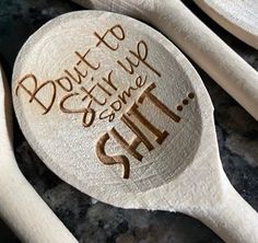 some spoons that have writing on them