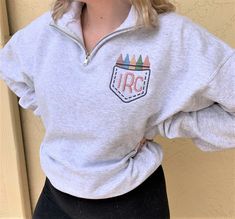 Say thank you to the teacher that shapes the minds of little ones throughout the school year! Our personalized rainbow quarter zip make a thoughtful end of year or christmas gift for the educator in your life. These cozy pullovers can be personalized with your embroidered monogram and worn cuddled up with some hot cocoa by the fire or when you're teaching in the classroom. Please use the Notes to Seller portion of your order to identify exactly how you would like your order to be created: Monogr Teacher Quarter Zip, Southern Teacher Outfits, Teacher Sweatshirt Ideas, Daycare Outfits Teachers, Teacher Monogram, Teacher Looks, School Monogram