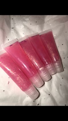 Do you want to start your own business?! Then think about buying wholesale! (Suggested Retail Price Per Tube: $5-$6) I make homemade organic lip gloss. I have recently started doing wholesale orders. I also sale lip gloss individually. Once you order wholesale, I make the lip gloss right away.  You can request a different scent and glitter or no glitter for any color. Scents Available: Vanilla, Berry, or Strawberry. You can request a different scent for $5 extra. GLOSSES: Redriguez: Sheer Red with Strawberry Scent Unicorn Blaze: Sheer Pink with berry Scent and color particles.  Connie: Sheer White with glitter and vanilla scent. Positive Pink: Non-Scented Sheer Pink Noah's Ark- Berry Scented, with glitter. Includes 4 colors. Ocean: This is a nice blue gloss with a glassy finish. Comes off White With Glitter, No Lips, Pink Gloss, Lip Gloss Homemade, Cute Nail Polish, Start Your Own Business, Lip Hair, Lip Glosses, Your Own Business