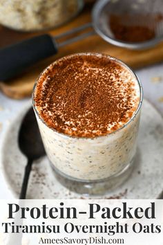 an oatmeal in a glass with cinnamon sprinkled on top