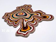 a rug with an abstract design on it