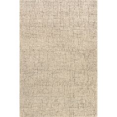 a beige rug with squares and lines on the bottom, in different sizes and colors