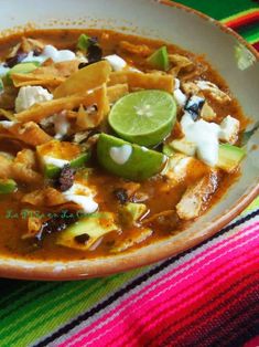 a bowl of mexican chicken tortilla soup