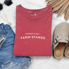 Show your support for local farm stands and sustainable living with our "Support Local Farm Stands" T-Shirt. Perfect for farmers, homesteaders, sourdough enthusiasts, and homeschool families, this tee is designed for those who value community, local agriculture, and self-sufficiency. Made from 100% ring-spun US cotton, this garment-dyed shirt offers unmatched comfort and durability, making it a staple for your everyday wardrobe. Key Features: Material: Crafted from high-quality, 100% ring-spun U Farm Stand, Everyday Activities, Neat Style, Sustainable Living, Everyday Wardrobe, Crew Neckline