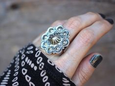 This listing is for one sterling silver concho statement ring. I make this ring from raw 18 gauge silver sheet using hand-carved two part metal dies to slowly form the rich shape into the beautifully intricate silver design. I then fire the focal piece onto a double 9 gauge half round sterling silver band. These beautiful rings are eye-catching, yet comfortable for all day wear. - Choose your size at check-out! - Concho measures 30 mm by 30mm. - Ring band is 6 mm tall. - Made to Order for your s Silver Design, Statement Ring Silver, Sterling Silver Bands, Ring Band, Flower Ring, Silver Flowers, Ring Silver, Sterling Ring, Silver Band