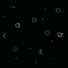 an image of some black and white objects in the dark sky with stars around them