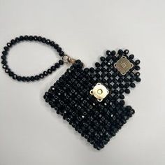 Handheld Beaded Clutch, Rectangular Evening Wristlet, Black Rectangular Wristlet For Gift, Beaded Rectangular Clutch As Gift, Beaded Rectangular Clutch For Gift, Rectangular Black Wristlet For Gift, Rectangular Black Wristlet As A Gift, Rectangular Beaded Clutch As Gift, Black Clutch Wristlet For Gift