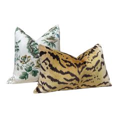 two pillows with tiger print on them