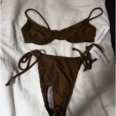 This Is A Very Flattering Bikini And Looks Very Good On Trendy Brown Swimwear For Vacation, Trendy Brown Swimwear For Summer, Brown Underwire Swimwear For Poolside, Summer Brown Swimwear With Tie-side Bottom, Summer Brown Tie-side Swimwear Bottom, Brown Swimwear For Summer, Brown Tie-side Bottom Swimwear For Summer, Casual Brown Swimwear For Sunbathing, Brown Swimwear For Sunbathing In Summer