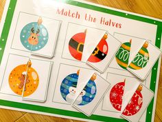 christmas themed match the halves game on a wooden table