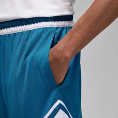 Bring street style and Jordan heritage to the court. These lightweight shorts are made from breathable mesh in a classic, relaxed silhouette. With sweat-wicking Dri-FIT technology and the iconic Diamond design, they'll keep you looking and feeling fresh all day. Elastic waistband with drawcord. Hand pockets. Striped knit tape. Dri-FIT technology helps you stay dry and comfortable. Mesh fabric is lightweight and breathable. Fabric: 100% polyester. Machine wash. Imported. Casual Blue Basketball Shorts, Casual Blue Basketball Athletic Shorts, Casual Blue Athletic Shorts For Basketball, Sporty Blue Basketball Shorts, Sporty Blue Shorts For Basketball, Athleisure Basketball Bottoms For Sports Season, Athleisure Basketball Bottoms, Sporty Blue Athletic Shorts For Basketball, Blue Athletic Shorts With Elastic Waistband For Streetwear