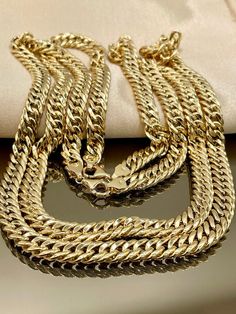 -              M A Y A J E W E L E R             - 18k Gold Curb Link necklace 22''inchesLENGTH,7.8mmTHICK,15.00grWEIGHT 18kGold Curb Link necklace 24''inches LENGTH,7.8mmTHICK,15.70grWEIGHT [Please text me if you want specific length or width ,i can customize it for you.] Priced to sell! Compare our prices to other similar sellers!  Arrives in a GIFT BOX and includes FREE SHIPPING within the USA and Canada. international shipping is available at the most economical rates on ETSY. I HAVE BEEN IN Gold Cuban Link Necklace With Box Chain As Gift, Gift Yellow Gold Cuban Link Necklace, Gift Cuban Link Necklace In Yellow Gold, Yellow Gold Cuban Link Necklace Gift, Yellow Gold Cuban Link Necklace As Gift, Yellow Gold Cuban Link Necklace, Men's Necklace Gold, Gold Necklace For Men, Unisex Christmas Gifts