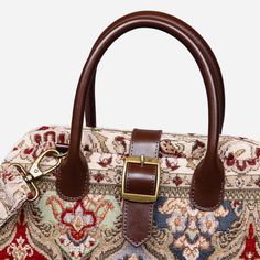 With a nod to the Victorian era, MCW’s freshly combines the classic and elegant design of the traditional carpet bag with a textural and tactile twist.The main body of purse-sized bags is made with thick chenille carpets. The handles and belts are genuine leather with heavy cotton canvas lining. Six bronze stands at the bottom allow the bag to stand stably. Every bag comes with a detachable and adjustable shoulder strap (55 inches) made from the same chenille as the bag and fixed with high-quality bronze hookers on the two ends.This Victorian Carpet Purse is perfect for everyday use. It features a zippered pocket (7-3/4 inches) with a leather cover and six multi function pockets. It is made convenient for organizing your necessities. Overall measurements:• Bag size: 14-1/8”W x 6.5”D x 10-1 Top Handle Tapestry Shoulder Bag For Daily Use, Daily Use Tapestry Shoulder Bag With Top Handle, Rectangular Weekender Bag With Adjustable Handle, Luxury Tapestry Shoulder Bag In Rectangular Shape, Travel Satchel With Adjustable Handle And Tapestry Material, Tapestry Satchel With Adjustable Handle For Travel, Beige Top Handle Tapestry Shoulder Bag, Beige Tapestry Top Handle Shoulder Bag, Travel Satchel With Detachable Strap And Tapestry Material