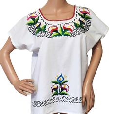 Wonderful vintage embroidered folk mexican blouse. This unique blouse was homemade from cotton with a beautiful embroiderer floral motives. I suppose it fits well size M / L. Please take a look at measurements /FLAT/ Shoulder to shoulder approx 15''/39cm Armpit to armpit: 22''/ 56cm length 25''/ 64cm Condition - very good, like unused More embroidered blouse https://www.etsy.com/shop/DejaVuShopGifts?search_query=embroidered+blouse Floral Motives, Floral Hand Embroidery, Mexican Blouse, Mexican Women, Unique Blouse, Women Blouse, Red Green Yellow, Embroidered Blouse, Floral Blouse