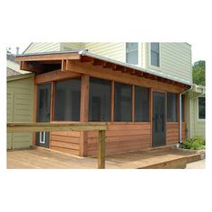 a house with a porch and screened in area