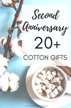 a cup of hot chocolate and marshmallows with the words, second anniversary 20 cotton gifts