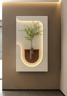 there is a vase with a plant in it on the wall