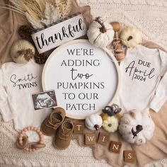 there are some pumpkins and other items on the blanket with words that read, we're adding two pumpkins to our patch