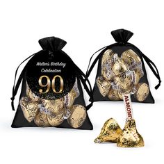 two bags filled with gold foiled chocolates