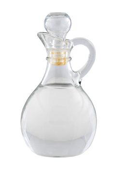 a clear glass bottle with a gold top