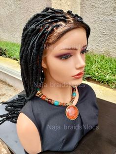 Full Lace Black Dread Wig. Natural-Looking Synthetic Dreadlock Wig for Women This is a full lace braided locs wig, making it a versatile choice for any occasion-whether you're heading out for a casual day or attending a special event. It's perfect if you want to try a new hairstyle or need a protective style that looks and feels beautiful . Color black ( same as pictures) Care and maintenance  Washing: Wash the wig gently in cool water with a mild shampoo. Don't scrub the dreads; just rinse well and squeeze out the water gently. 2. Drying: After washing dread wig, pat the wig dry with a towel and lay it flat to air dry. Avoid using heat tools, as they can damage the wig. 3. Styling: The full lace dread wig comes pre-styled with beautiful dreads, but you can lightly reshape them with your f Wig On Dreadlocks, Loc Wigs For Sale, Braided Locs, Dread Wig, Dreadlock Wig, Black Dreads, Afro Braids, Lace Braid, Mild Shampoo