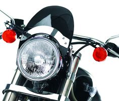 the front light of a motorcycle on a white background