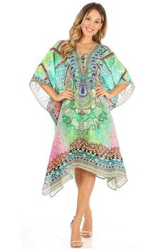 This caftan dress cover up features a beautiful handmade cut. It has a beautiful multi toned tribal pattern print with a v-neck and rhinestone embellishments around the neckline. The dress is long and tall, and has adjustable drawstrings at the neckline that can be left undone or tied as desired. The dress is very lightweight and airy. Bohemian Multicolor Print V-neck Kaftan, Green Printed V-neck Kaftan, Green V-neck Printed Kaftan, Vibrant Print V-neck Tunic, Multicolor Printed V-neck Kaftan, Multicolor Bohemian Dress With Split Neck, Bohemian Multicolor Split Neck Dress, Casual Multicolor V-neck Tunic, Multicolor V-neck Kaftan With Vibrant Print