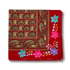 a red bandana with colorful flowers on it