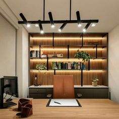 an office with wooden shelves and bookshelves