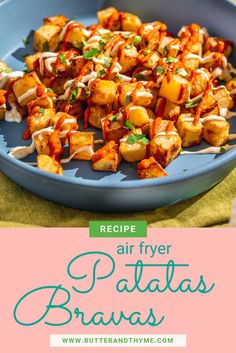 the recipe for air fryer potatoes is shown in a blue bowl on a green table cloth