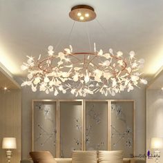 a chandelier hanging from the ceiling in a living room