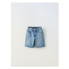 Baggy fit Denim shorts with adjustable interior waistband, back elastic, and front button closure, size 6 with snap button. Front pockets and back patch pockets.