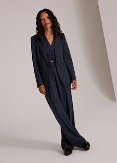 Our single button blazer could be our single most favorite layer. Crafted in navy pinstripe in a blend suiting fabric, The Favorite Blazer has a contoured waist so it hangs beautifully and gives just enough shape and structure. We wear it with everything (yes, everything) but we swoon over the suiting set when paired w Chic Striped Notch Lapel Suit, Chic Striped Suits For Office, Chic Striped Suits With Notch Lapel, Chic Pinstripe Suits For Office, Chic Striped Business Suits, Pinstripe Outerwear With Notch Lapel And Welt Pockets, Chic Pinstripe Suits For Business, Chic Pinstripe Business Suits, Chic Pinstripe Suits With Notch Lapel