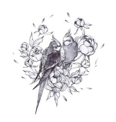 two birds sitting on top of a branch with flowers