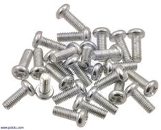 a bunch of screws and nuts on a white background