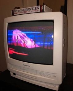 an old television sitting on top of a table