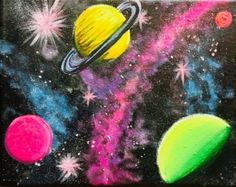 a chalkboard drawing of the solar system with stars, planets and saturn on it